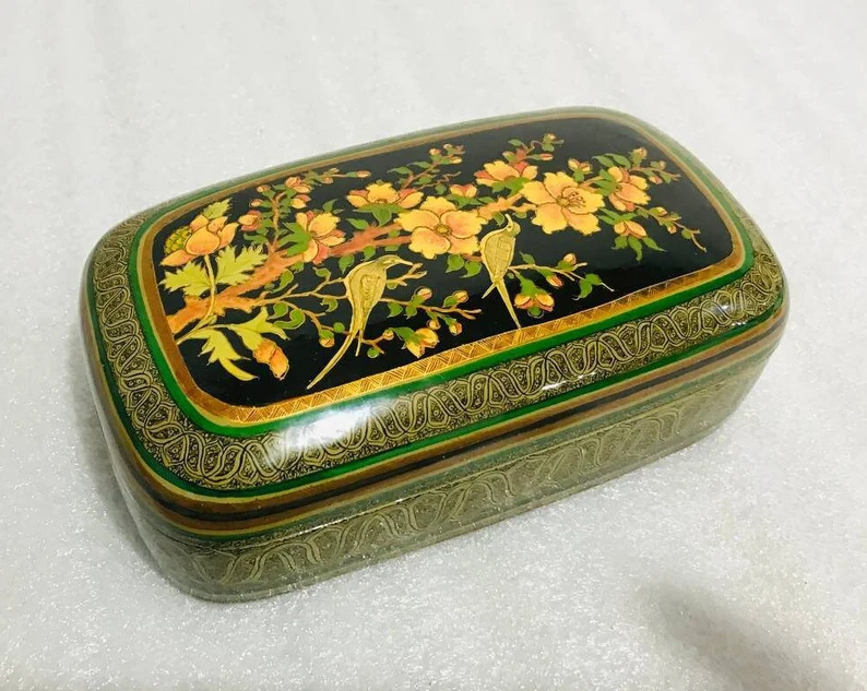Authentic lacquered paper mache box , hand painted by kashmiri artisians with pure gold work depicting floral designs and bird motifs